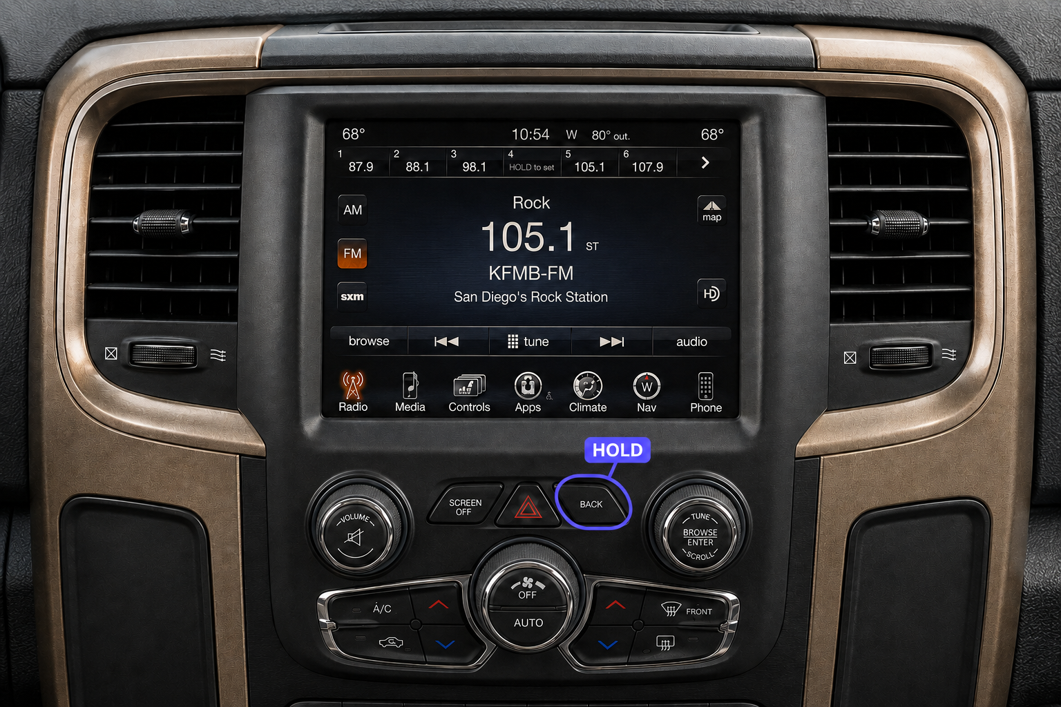 Original Dodge Uconnect console showing the BACK button to press and hold